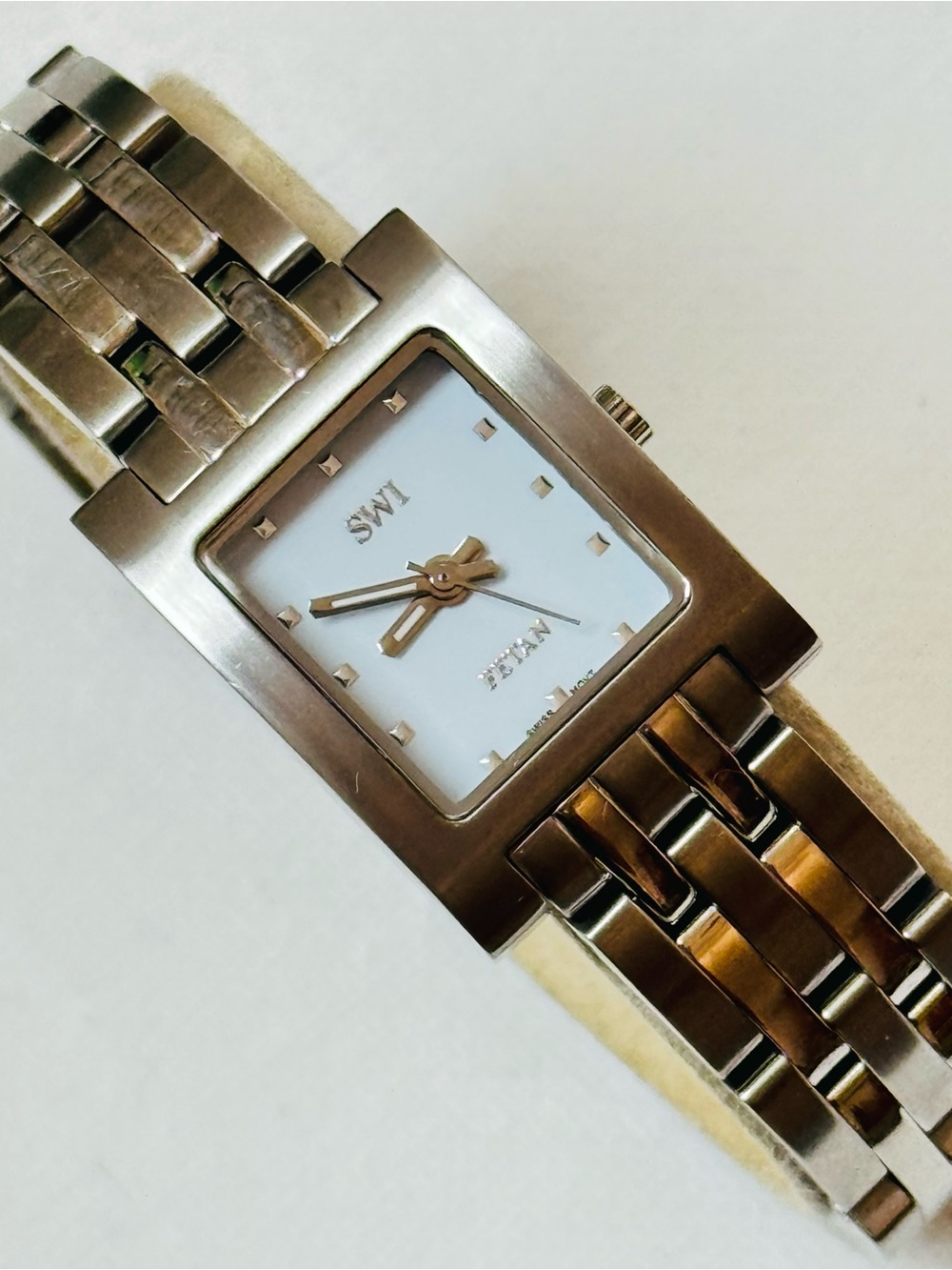 SWI Fetan Swiss Watch International White Dial Women's Silver Tank Bracelet
